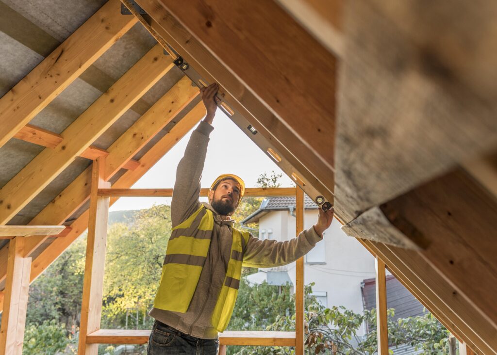 Man building house