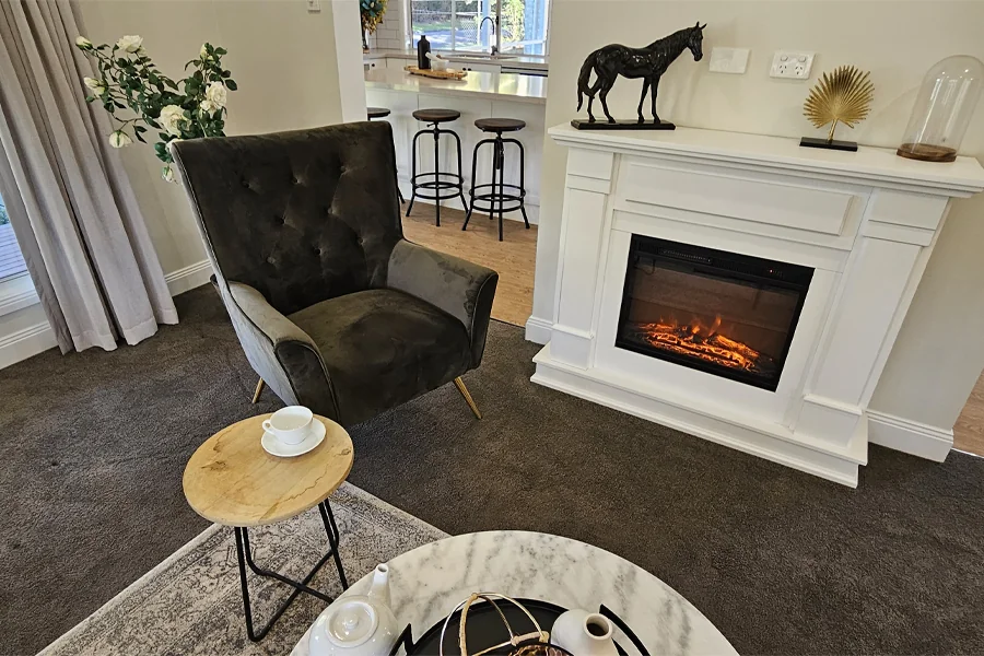 Comfortable living area with fireplace in a rural home during winter