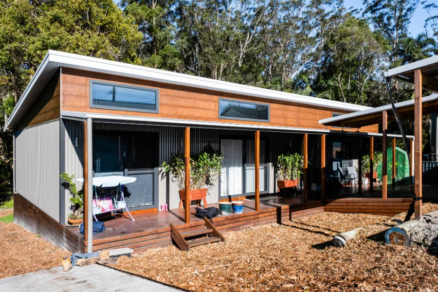 Finished Australian family home with verandah overlooking a rural landscape.